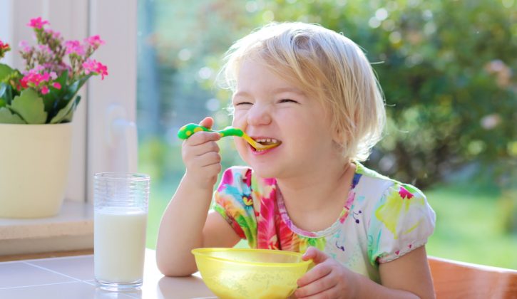 Child Enjoying Breakfast