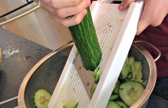 Slicing-cucumbers-with-a-mandolin