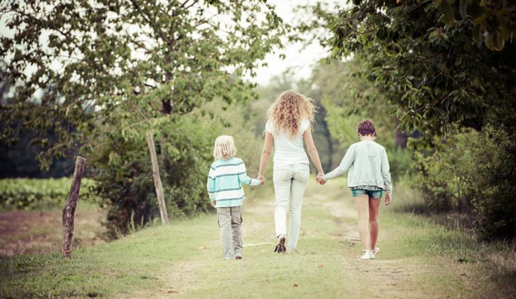 Young-Woman-with-Two-Children-Outside