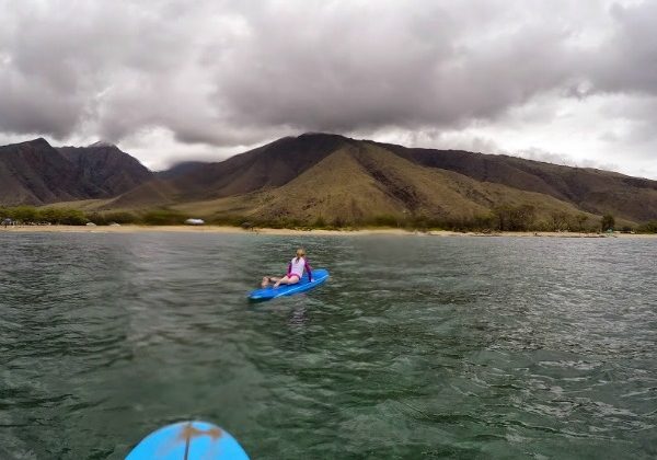 Girl-surfing-maui