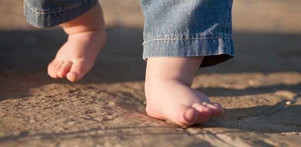 bare-baby-feet-dirt-road-612x300