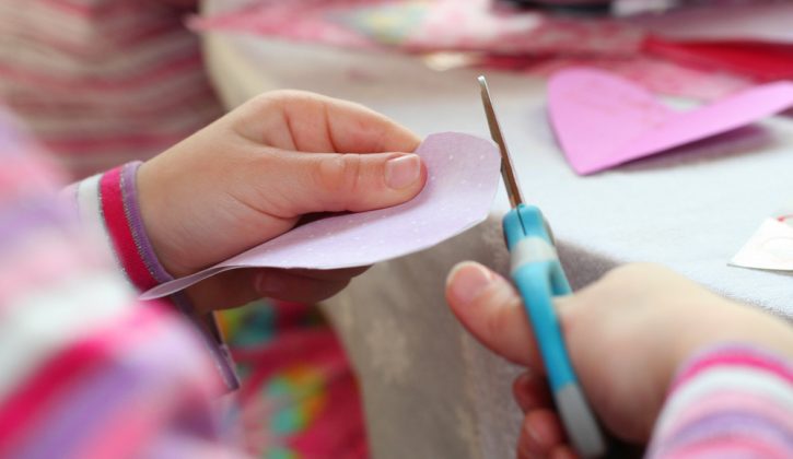 Child Making Valentine Craft