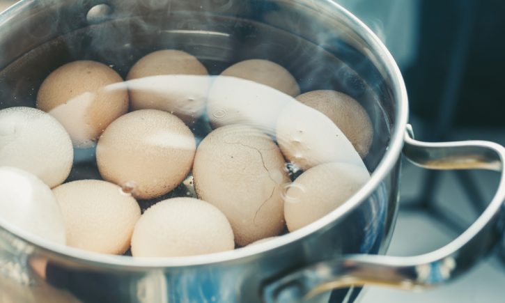 Eggs Boiling in Pot
