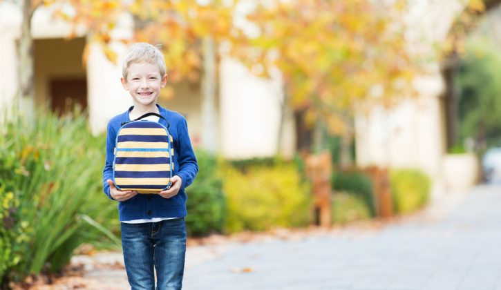 Kid Holding Lunchbox Outside