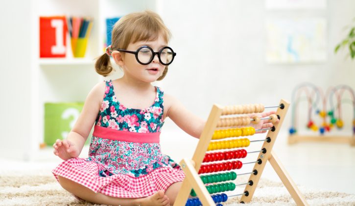 Smart Kid Playing with Educational Toy