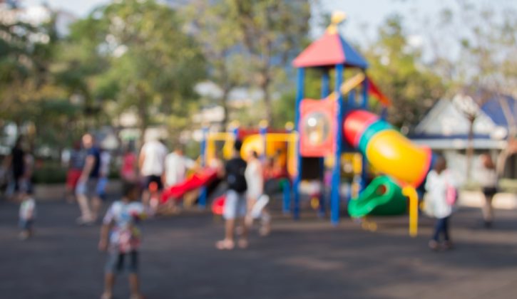 Young mom in schoolyard